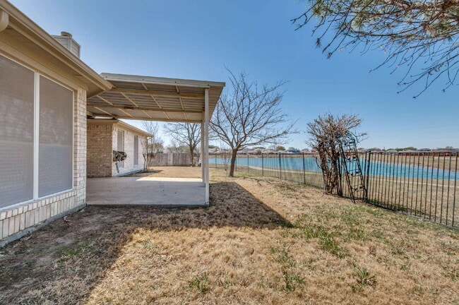 Building Photo - Beautiful 4BD Home with Pond Views & Covered Patio