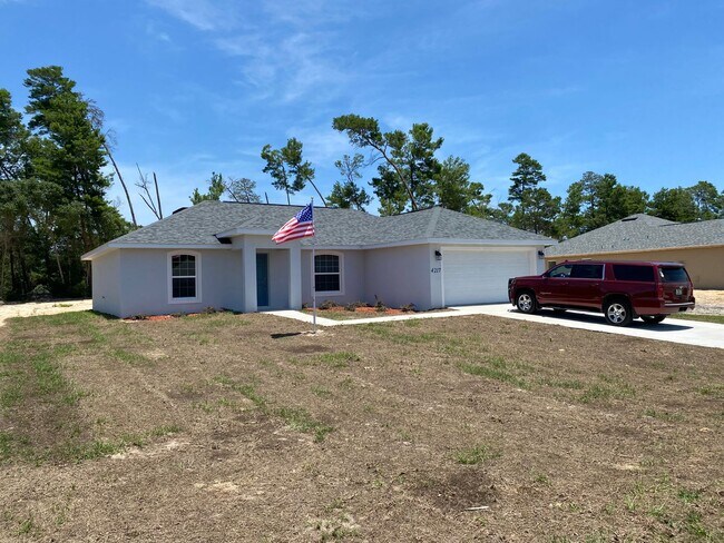 Building Photo - NEW CONSTRUCTION - Desirable SW Ocala Neighborhood 3/2/2 *WON'T LAST*