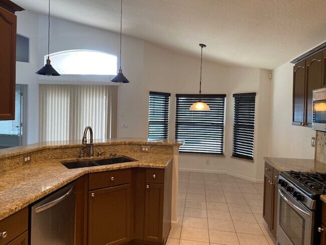 Building Photo - Lakefront 3-Bedroom Pool Home in Gated Com...