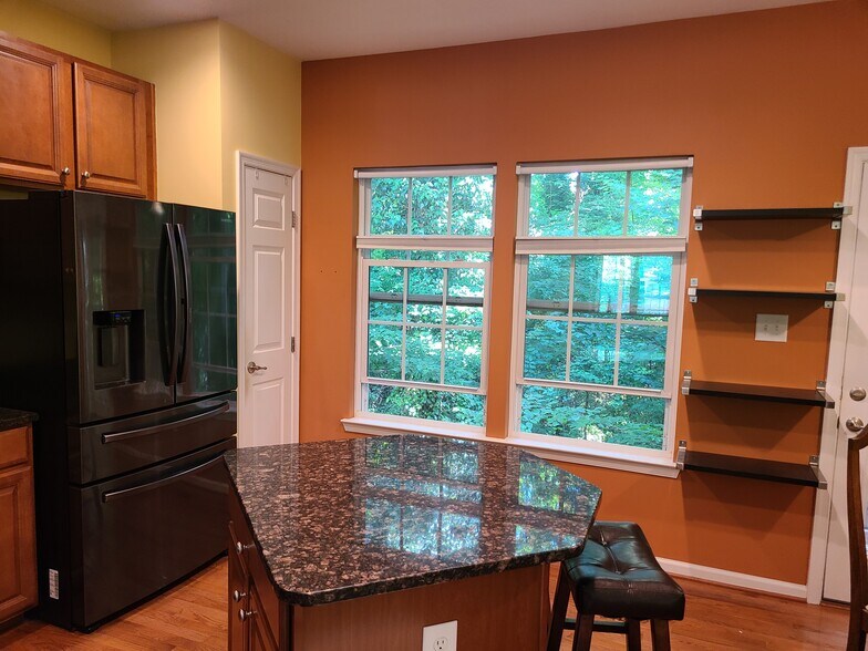 Kitchen island and back view - 832 Rock Creek Rd