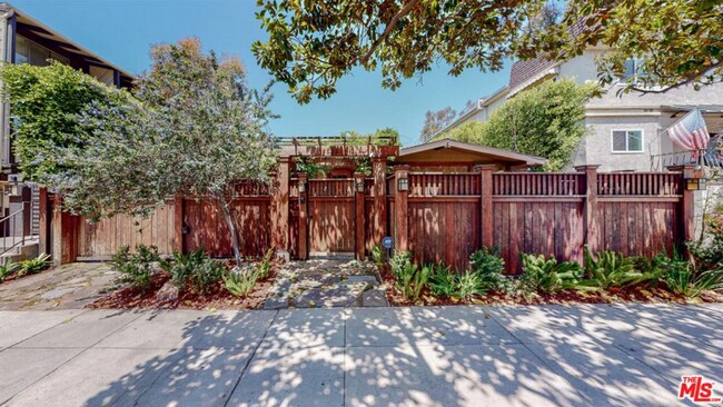 Building Photo - Impeccably restored Craftsman Securely Gated and Hedged for Privacy!