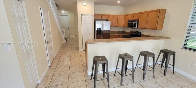 Building Photo - 8872 W 35th Ct