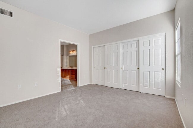 Building Photo - FIRST FLOOR CONDO IN GATED COMMUNITY W/ SINGLE CAR GARAGE