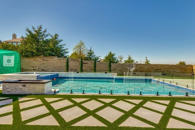 Building Photo - A must see in highly sought after Windsong...