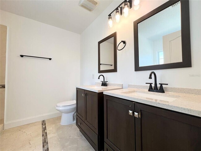 Building Photo - 7138 Five Oaks Dr