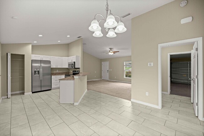 Building Photo - Newer 3BR Home on Nearly 1/4 Acre | Screened Lanai | Available Now!