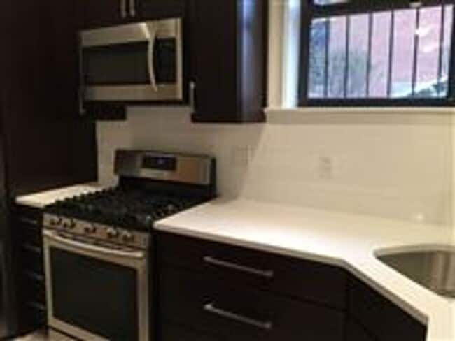 Building Photo - Garden Level Unit. No Brokers Fee, No Security Deposit, Heat and Hot Water Included, Elevator, La...