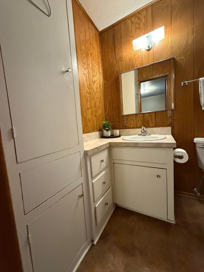 Building Photo - 1/1 NEW FLOORING ON-SITE LAUNDRY FACILITY-...