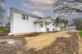 Building Photo - Brand New 5 Bedroom Duplex Unit!