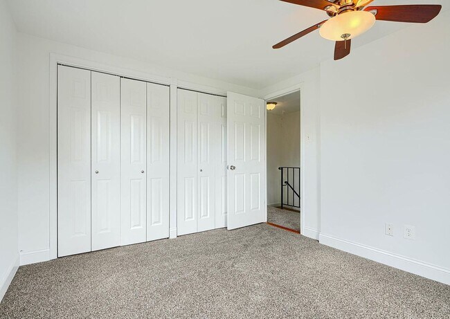 Building Photo - Updated End-of-Group Townhome with Finished Lower Level, Fenced Yard & Community Pool
