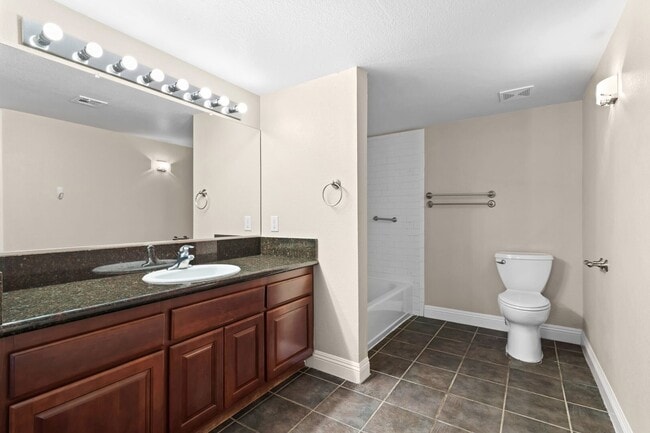 Building Photo - SE!!! Gated!! 1 Bedroom 1st Floor!! One Car Garage!!! Community Pool, Spa, Clubhouse!!! All tile ...