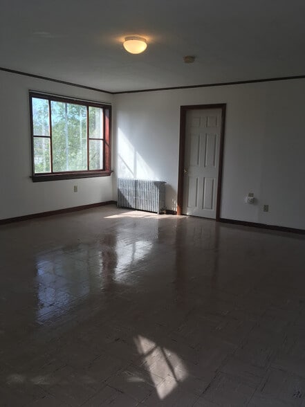 View of Living Room looking towards large window facing O'Brien Avenue. - 16 Obrien Ave