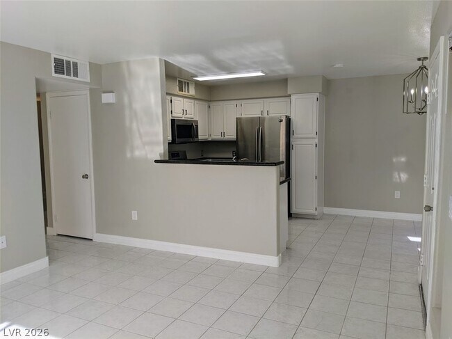 Building Photo - 5710 E Tropicana Ave