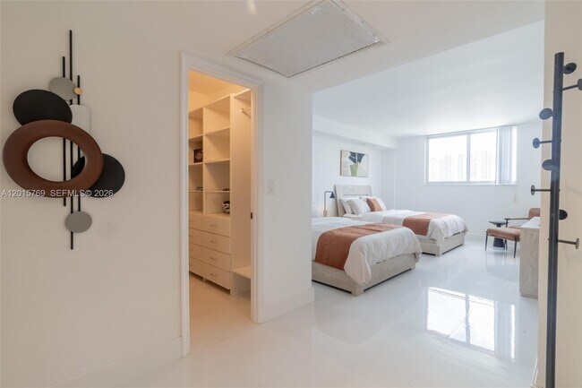 Building Photo - 19370 Collins Ave