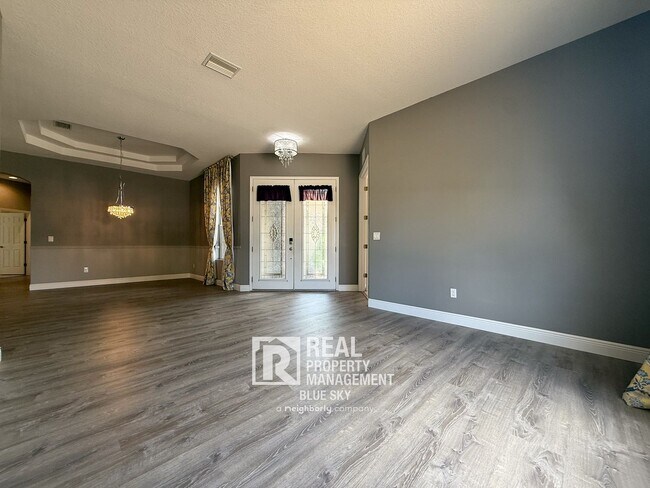 Building Photo - Executive Home with Custom Finishes in Gat...