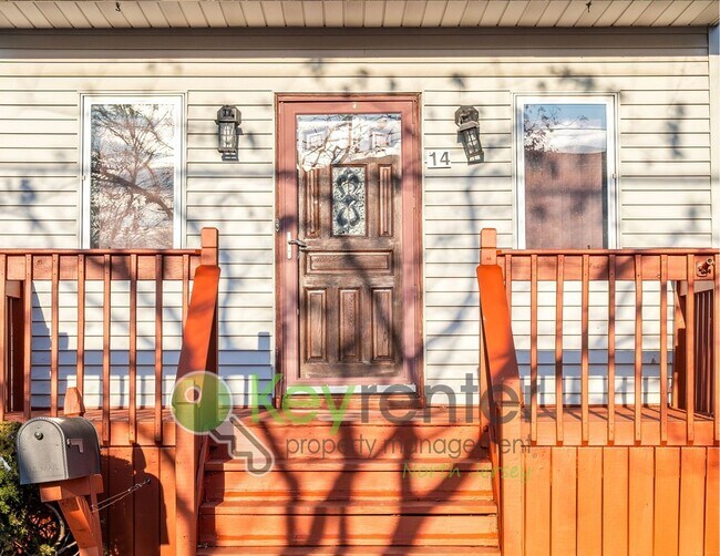 Building Photo - Spacious 2BR / 2.5BA Home with Huge Deck, Private Yard & Parking for 6