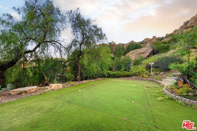Building Photo - 8657 Valley Flores Dr