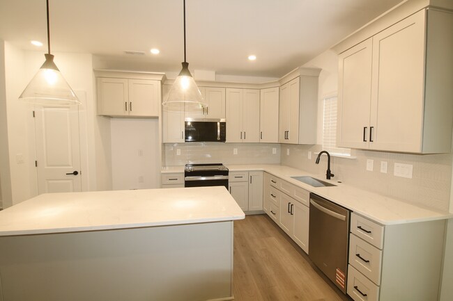 Building Photo - Bright & Modern New Construction Townhome