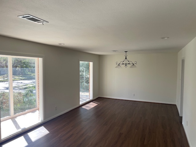 living room and dining area adjacent to the kitchen - 3706 Murworth Dr