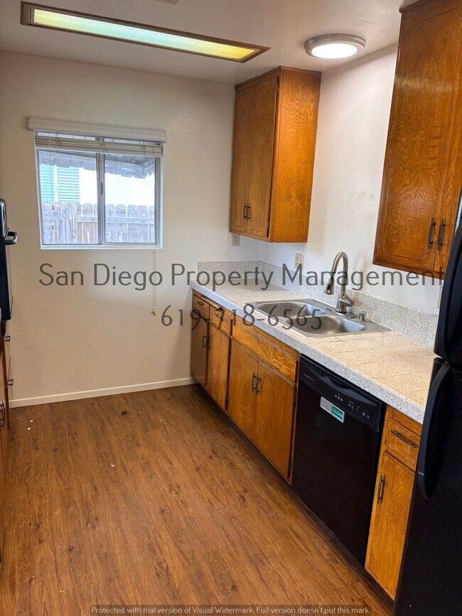 Building Photo - Charming 3-Bed with New LVP Flooring & Scenic Backyard Views