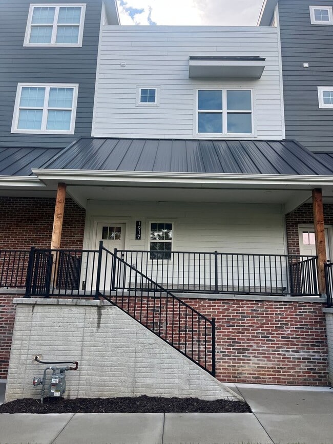 Building Photo - New Construction, 2 bed, 3 bath Row Home, with 2 car garage, fireplace, and rooftop deck!
