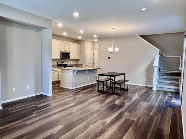 Building Photo - Beautifully Maintained 4BR/3.5BA Townhome with Finished Basement in Prime Aurora Location w/2-Car...