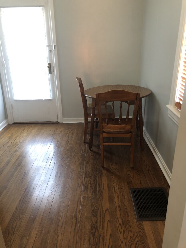 Wood floors in living room. - 718 S Norman Ave