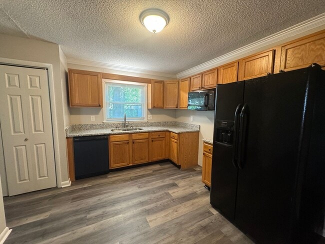 Building Photo - Move In Ready! Updated 3 Bedroom Brick House off Guess Road Near Carver St, Durham NC