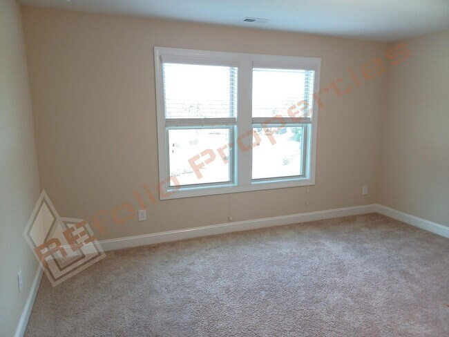 Building Photo - Luxury 5 Bedroom, 3 Bath, 2-Car Garage End Unit Townhouse w/1st level Primary Suite + Guest Suite...