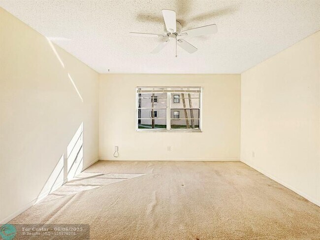 Building Photo - 6090 N Sabal Palm Blvd