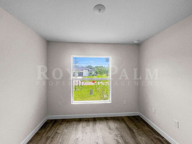 Building Photo - Spacious 3BR/2BA Duplex in Lehigh Acres & $500 Off Your First Month If You Apply by Aug 20th!