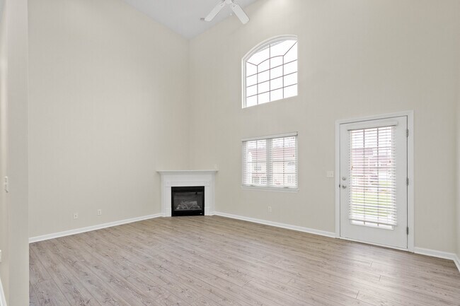 Living area with vaulted ceiling - 74 Nicholas Dr