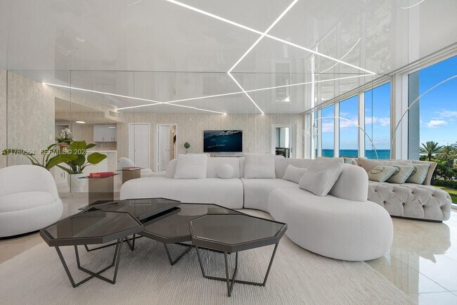 Building Photo - 10275 Collins Ave