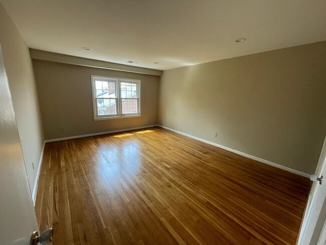 Building Photo - A fully updated Four Bedroom, Three and On...