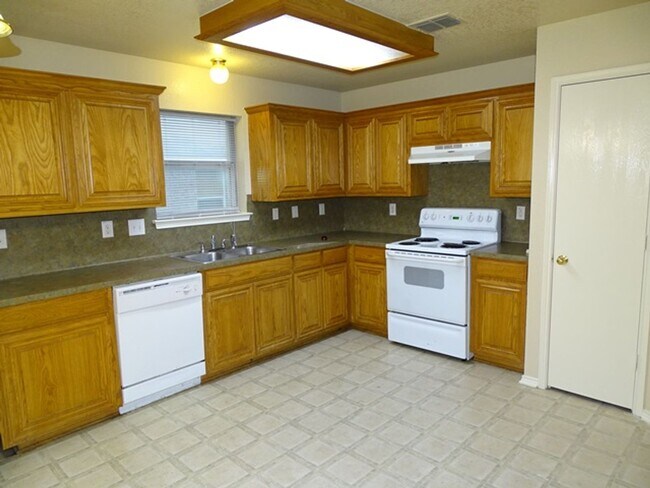 Building Photo - 6046 Mountain Meadow