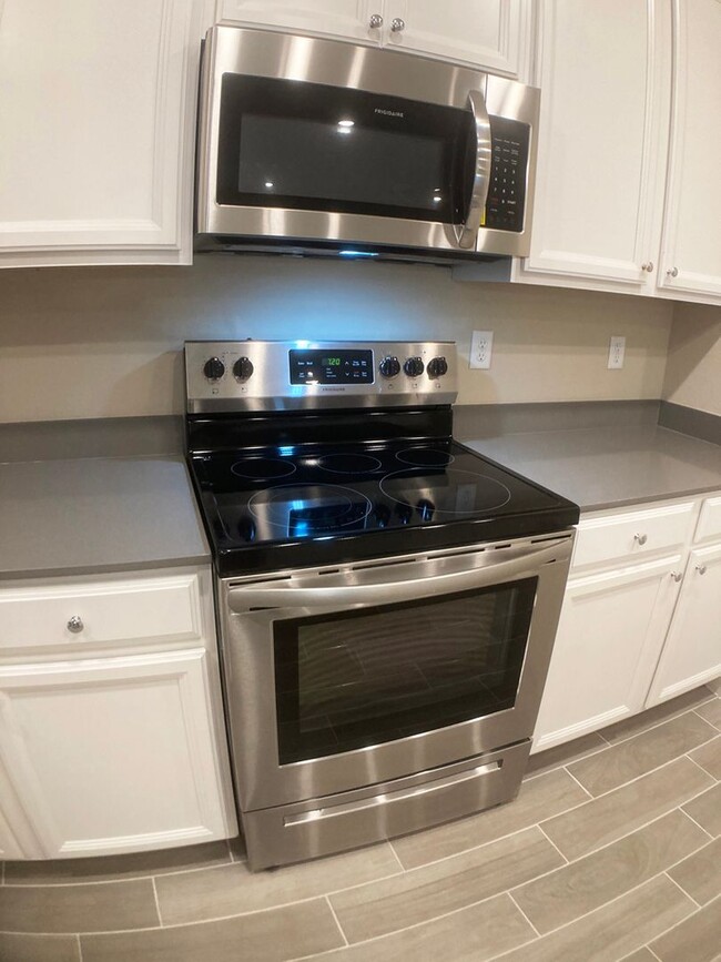 Building Photo - Your Private Escape with High-End Finishes...