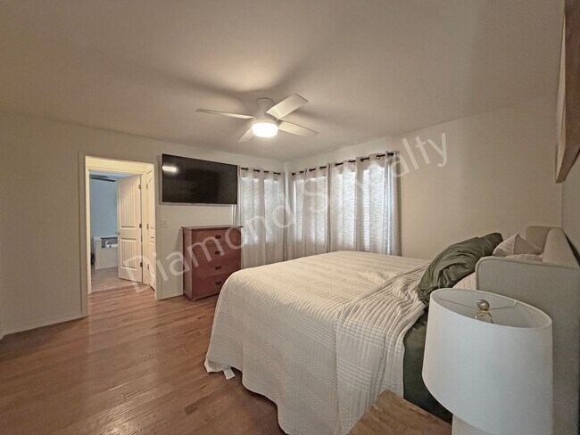 Building Photo - Stunning 3_Bed Home with Two Primary Suites & a Pool!