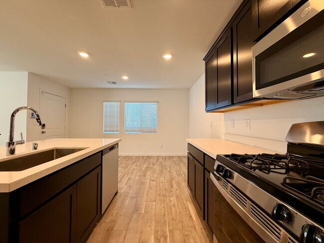 Building Photo - 4 BED 3 BATH 2 CAR GARAGE TOWNHOUSE + LOFT ON CORNER LOT w/ BALCONY