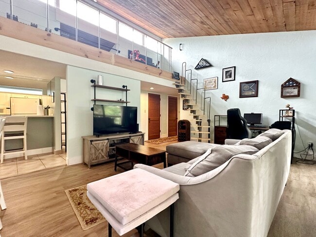 Building Photo - Lofty Vibes & Backyard Views – Your Dream ...