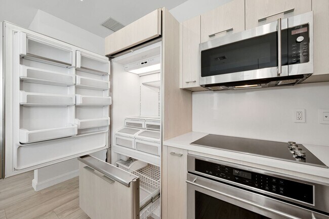Building Photo - Remarks:	Enjoy stunning Skyline and Bay views from the wraparound balcony of this furnished 2-bed...