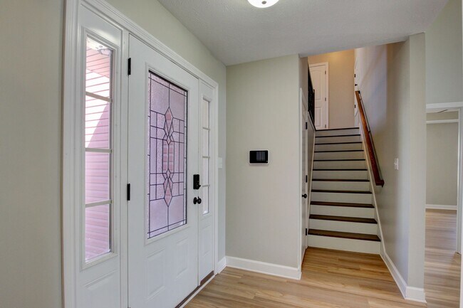 Building Photo - Fantastic Open Floor Plan Home With Stone Front Fireplace, Stainless Steel Appliances, And Close ...