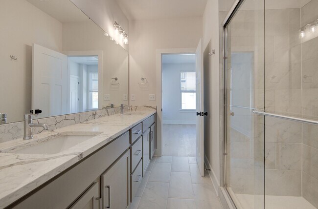 Building Photo - COMING SOON! Modern End-Unit Living Near Uptown | Rooftop Terrace + Tandem Garage