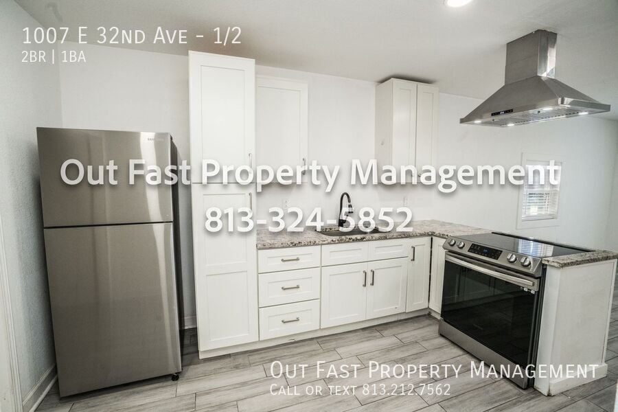 Building Photo - 1007 E 32nd Ave