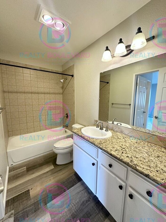 Building Photo - Contemporary 2-Bed Condo with Garage & Poo...