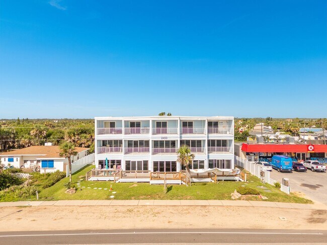 Building Photo - Luxury Oceanfront Living – Fully Furnished...