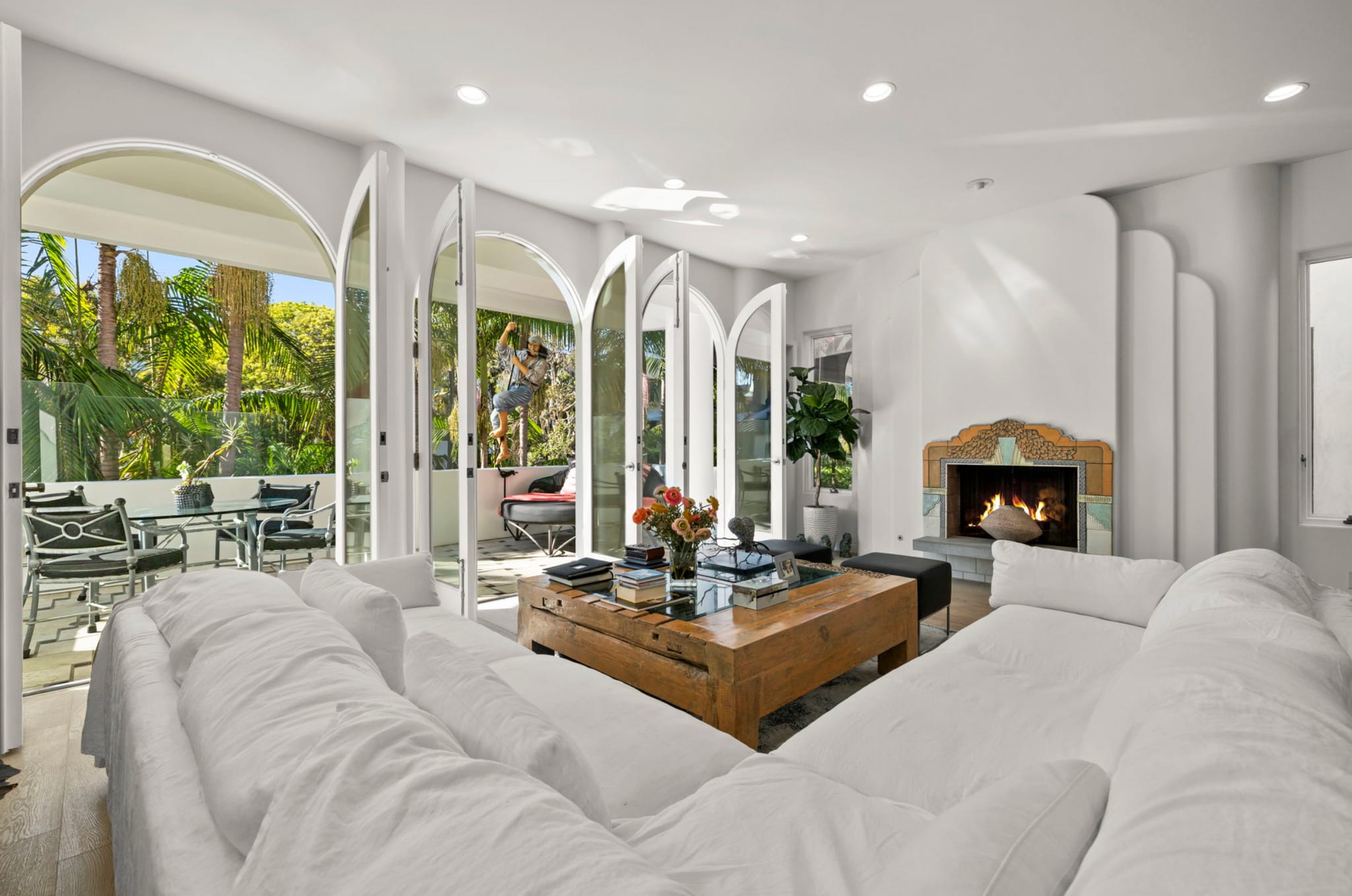 Elegant living room anchored by a rare wod-burning fireplace. - 120 Mast Mall