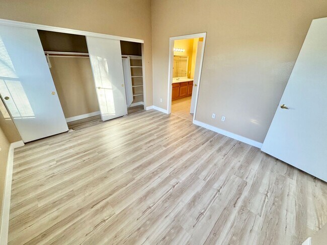 Building Photo - Welcoming 2 Bedroom home with private balcony located in South Las Vegas Community