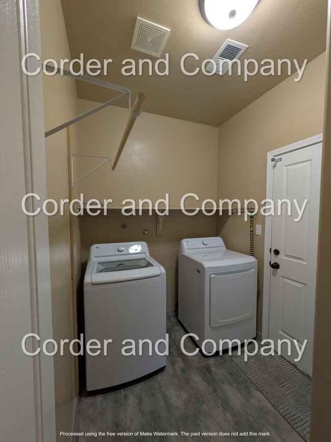 Building Photo - Massive 2 Story 3Bedroom 2.5 Bathroom, 2 Car Garage Townhouse at 1,838 Sq Ft.