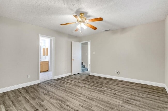 Building Photo - 8105 Flowertree Dr