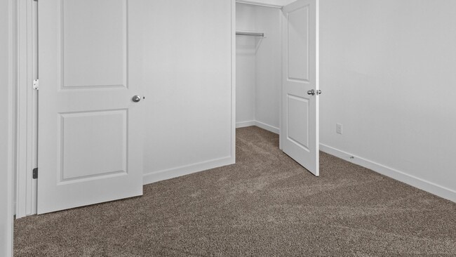 Building Photo - Brand-New Modern Townhome with Stunning Views!